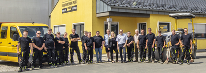 Gruppenfoto der Mitarbeiter der Bauunternehmung Preiss GmbH